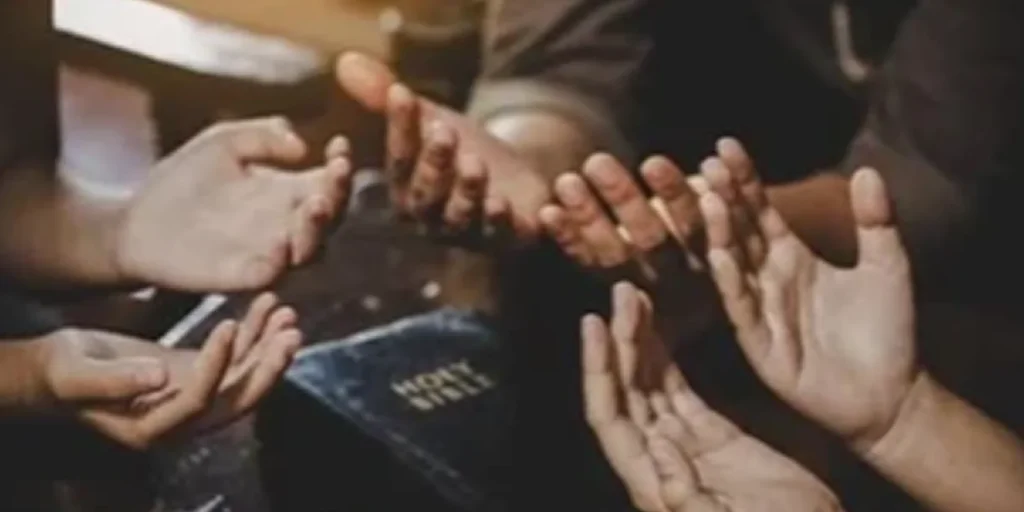 Hands Raised in Prayer